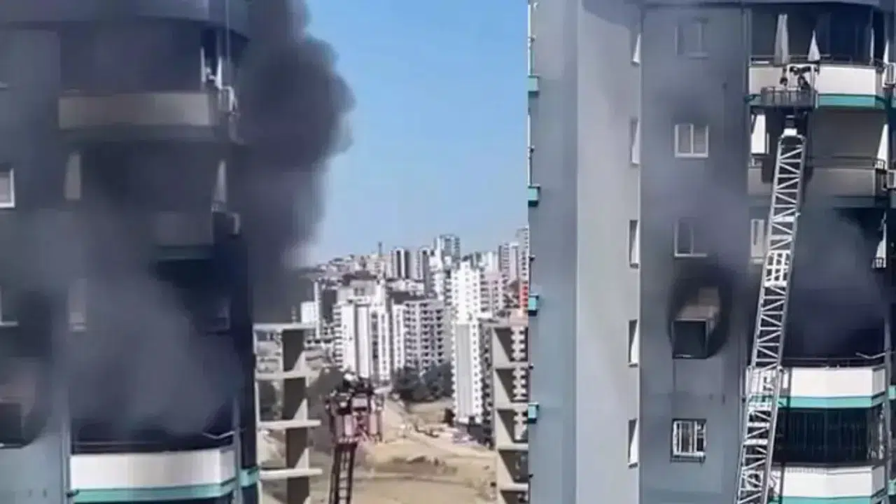 Adana’da 13. katta yangın : Baba ve bebeğini inşaat işçisi kurtardı