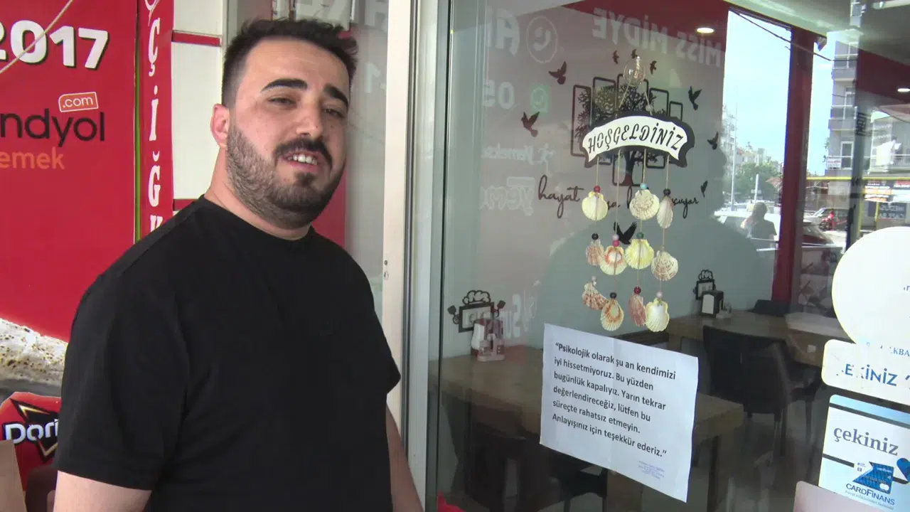 Antalya'da iş yerinin camına 'Psikolojik olarak kapalıyız' notu asan esnaf dükkanı açmadı