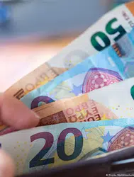 Alman hükümeti tarafından önerilen bin euro prim planı işverenleri neden endişelendiriyor?