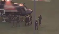 Maduro ve eşi helikopterle mahkemeye götürülüyor!