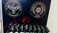 İzmir'de güvercin kafesine gizlenmiş 124 tabanca ele geçirildi