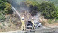 İzmir'de seyir halindeki otomobil alev aldı : Araç kullanılamaz hale geldi