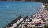 Sıcak havadan bunalan İstanbullular plajlara akın etti