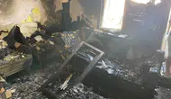 Manisa'da 4 katlı apartmanda korkutan yangın : Ev kullanılmaz hale geldi
