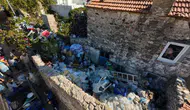 Muğla Datça'da çöp evden 5 ton atık çıkarıldı
