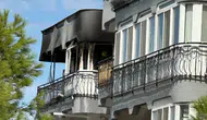 Balıkesir Ayvalık'ta kızgın yağa su dökülmesi sonucu yangın çıktı
