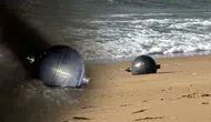 Avustralya'da sahile vuran gizemli küreler ne? Uzay Ajansı harekete geçti!