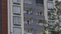 Adıyaman'da bi şahıs kendini beşinci kattan sarkıttı