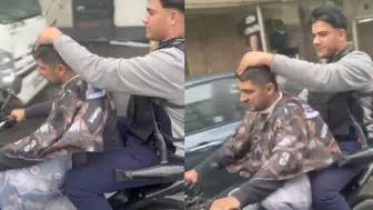 Sultangazi'de şaşkınlık yaratan anlar: Seyir halindeki motosiklette tıraş!