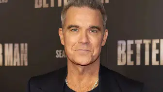Robbie Williams, The Beatles'ı geçerek rekor kırdı!