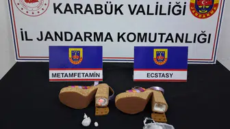 Karabük'te kadın ayakkabısının topuğundan uyuşturucu çıktı : 3 şüpheli adliyede