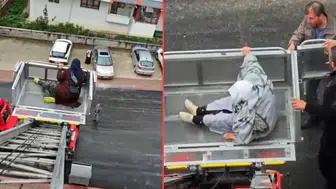 Burdur'da bir nakliyeci, yaşlı annesi ve halasını yük asansörüyle evine çıkardı