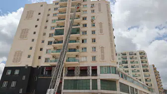 Mardin'de 10 katlı binanın giriş katında yangın : 6 kişi hastaneye kaldırıldı