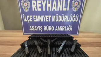 Hatay'da otomobilin gizli bölmesinde 80 tabanca sürgü takımı ele geçirildi