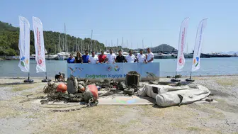 Fethiye'deki Göcek Halk Plajı'nda deniz dibi temizliği yapıldı