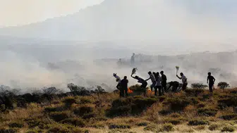 Iğdır'da anız yangını paniği : Alevler yerleşim yerlerine ulaşmadan söndürüldü