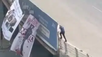 Adana'da NATO'yu protesto etmek için köprüye pankart asan kişi gözaltına alındı