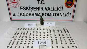 Satmak için müşteri arıyordu ! Eskişehir'de 194 bronz sikke ve elmas ele geçirildi