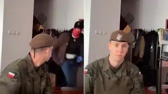 Polonya'da Askeri Üniforma ile Alay Eden Şahıs Canlı Yayında Yakalandı