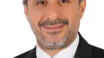İrfan Çelikaslan kimdir ve siyasi kariyeri nasıldır?