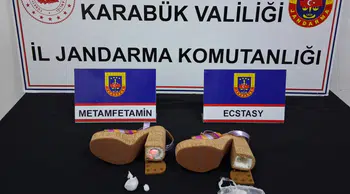Karabük'te kadın ayakkabısının topuğundan uyuşturucu çıktı : 3 şüpheli adliyede