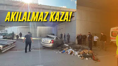 Otomobil üst geçitten aşağı düştü