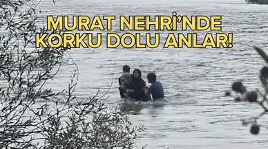 4 kişilik aile nehrin ortasında mahsur kaldı!