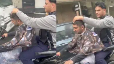 Sultangazi'de şaşkınlık yaratan anlar: Seyir halindeki motosiklette tıraş!