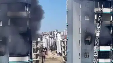 Adana’da 13. katta yangın : Baba ve bebeğini inşaat işçisi kurtardı