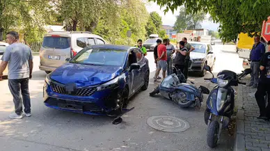 Bursa'da otomobil ile çarpışan motosiklet sürücüsü yaralandı