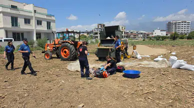 Hatay'da tamir etmek istediği harman makinesine düşen genç öldü