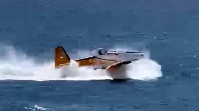Çanakkale'de denizden su alırken havalanamayan yangın uçağı kıyıya çekildi