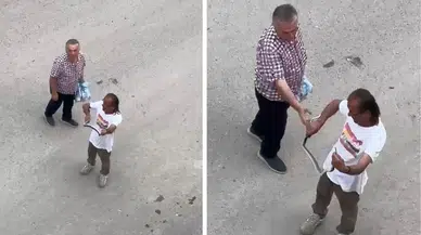 Sakarya’da şaşırtan müdahale : Evde dolaşan yılanı çıplak elle yakaladı