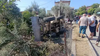 Bahçeye devrilen iş makinesinin sürücüsü öldü