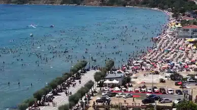 Sıcak havadan bunalan İstanbullular plajlara akın etti