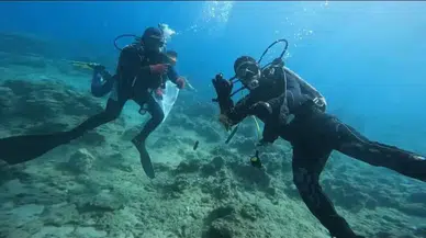 Fethiye Göcek Halk Plajı'nda deniz dibi temizliği yapıldı