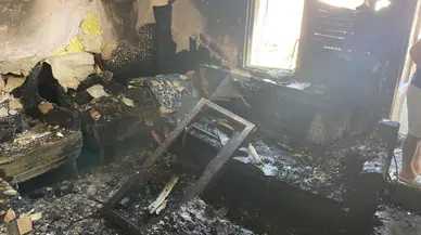 Manisa'da 4 katlı apartmanda korkutan yangın