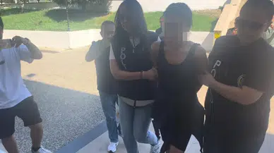 Türk bayrağını yakmaya çalışan kadın tutuklandı