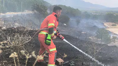 Muğla'da yangın : Ormana sıçramadan kısmen kontrol altına alındı