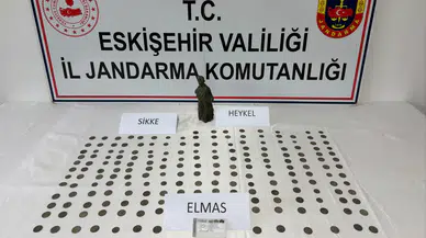 Satmak için müşteri arıyordu ! Eskişehir'de 194 bronz sikke ve elmas ele geçirildi