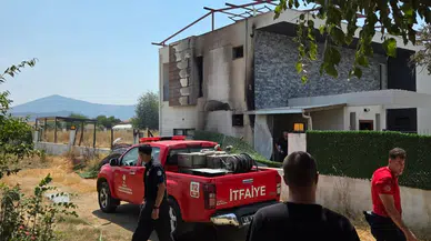 Milas'ta evin bitişiğindeki odunlar alev alev yandı
