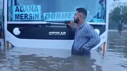 Hatay’da sağanak yağışta minibüs sular altında kaldı