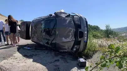 Takla atan otomobilden sağ kurtuldular