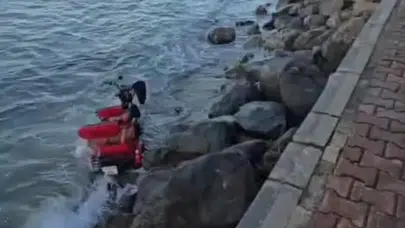 Bursa Mudanya'da 3 tekerlekli elektrikli motosiklet denize uçtu