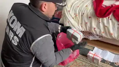 Kars'ta tefecilik operasyonu : Poşetler dolusu para ve senet ele geçirildi