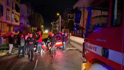 Balıkesir Edremit'te park halindeki araca çarpan otomobil takla attı