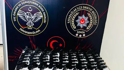 İzmir'de güvercin kafesine gizlenmiş 124 tabanca ele geçirildi