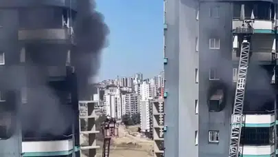 Adana’da 13. katta yangın : Baba ve bebeğini inşaat işçisi kurtardı