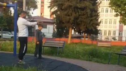 Adana'da parkta skandal görüntüler : Çocuğa oyuncak silahla atış talimi yaptırdı