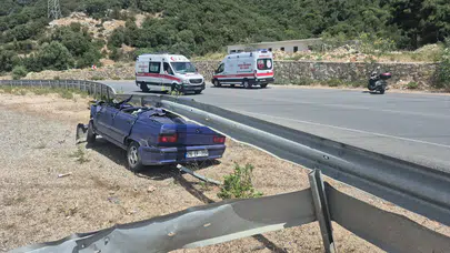 Bodrum’da korkutan kaza : Otomobil çelik bariyerlerin altına girdi